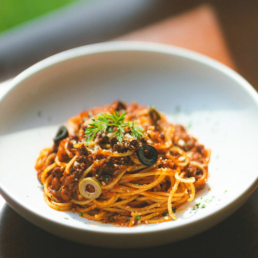 Tagliolini Puttanesca mit karamelisierten Cherrytomaten